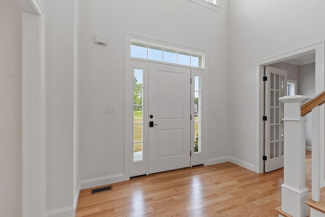LOT16 Rawson Farm, Mendon, MA 01756 - foyer entrance with baseboards, stairs, visible vents, and light wood finished floors