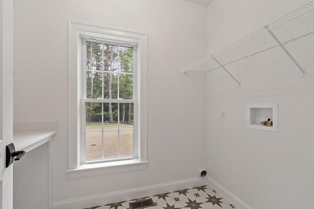 LOT16 Rawson Farm, Mendon, MA 01756 - laundry room with hookup for an electric dryer, hookup for a washing machine, baseboards, laundry area, and light floors