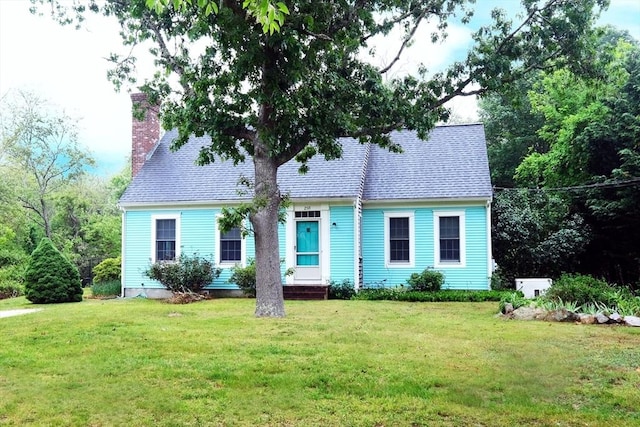 250 S Eastham St, Eastham, MA 02642 - cape cod-style house featuring a chimney and a front lawn