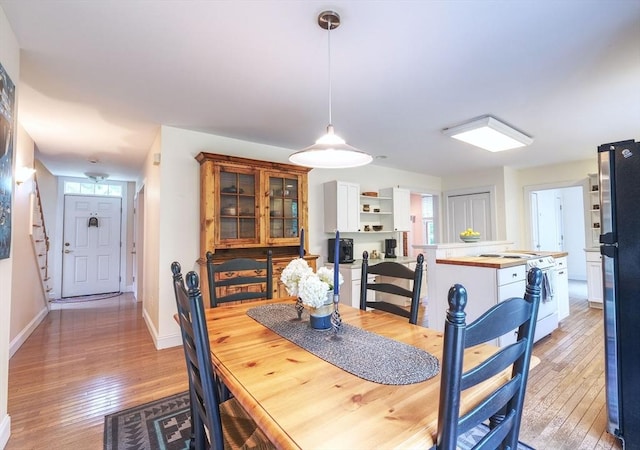 250 S Eastham St, Eastham, MA 02642 - dining room with light wood finished floors and baseboards