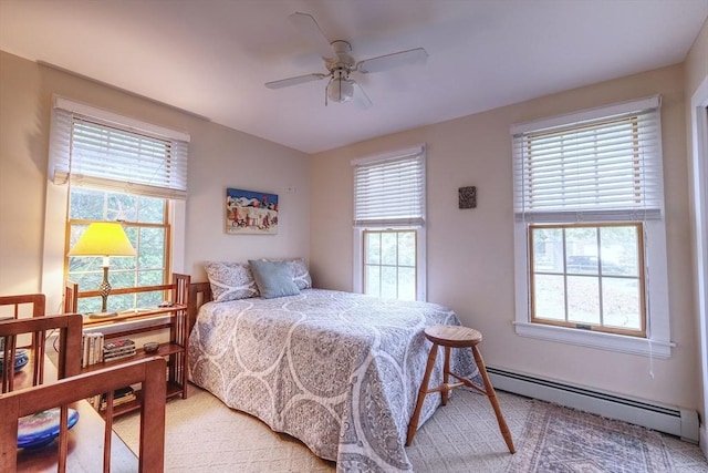 250 S Eastham St, Eastham, MA 02642 - bedroom with a baseboard heating unit and ceiling fan