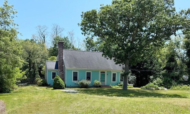 250 S Eastham St, Eastham, MA 02642 - new england style home featuring a chimney and roof with shingles