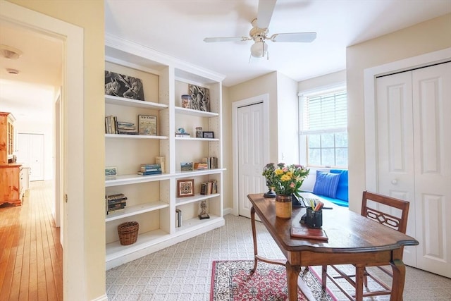 250 S Eastham St, Eastham, MA 02642 - office space featuring ceiling fan, built in shelves, light wood-style floors, and baseboards