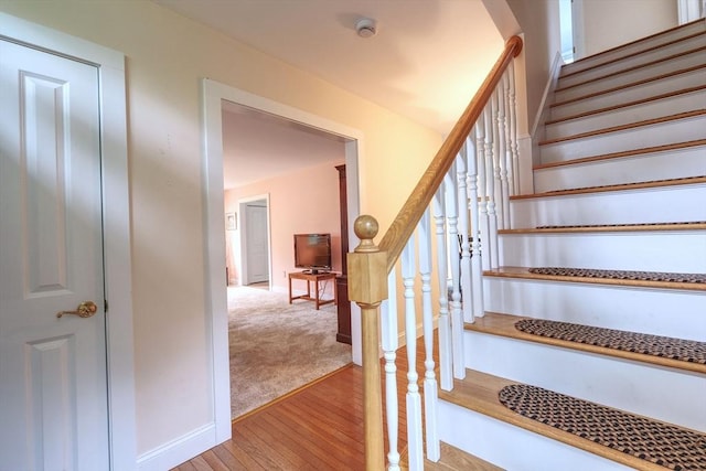 250 S Eastham St, Eastham, MA 02642 - stairs with wood finished floors and baseboards