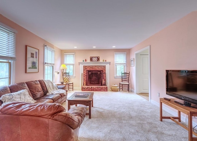 250 S Eastham St, Eastham, MA 02642 - living room featuring light colored carpet, baseboards, a fireplace, and recessed lighting