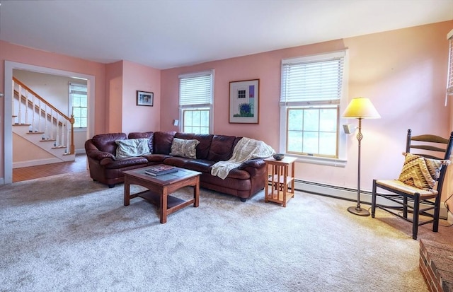 250 S Eastham St, Eastham, MA 02642 - living room with carpet, stairway, baseboards, and a baseboard radiator