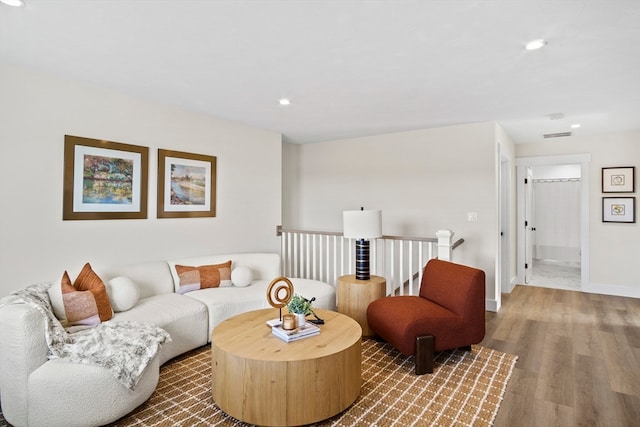 living room with wood-type flooring