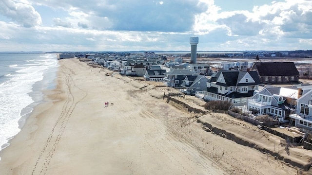 aerial view featuring a water view and a view of the beach