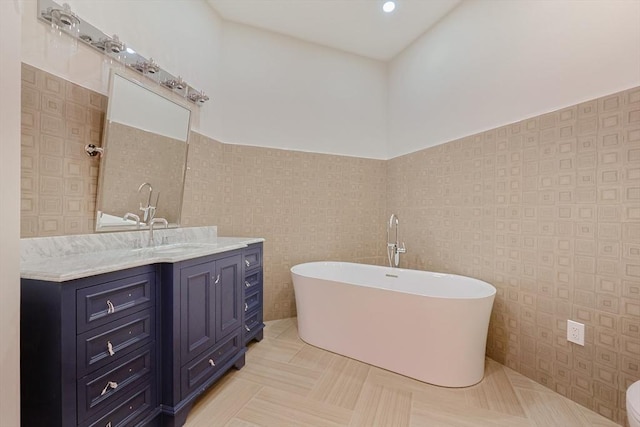 515 Centre St Unit 2, Newton, MA 02458 - full bath featuring a freestanding bath, vanity, and tile walls