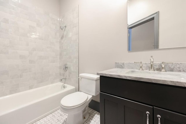 515 Centre St Unit 2, Newton, MA 02458 - bathroom with vanity, toilet, shower / bath combination, and tile patterned floors