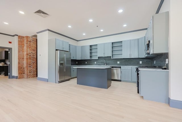 515 Centre St Unit 2, Newton, MA 02458 - kitchen featuring stainless steel appliances, open shelves, a center island, backsplash, and ornamental molding