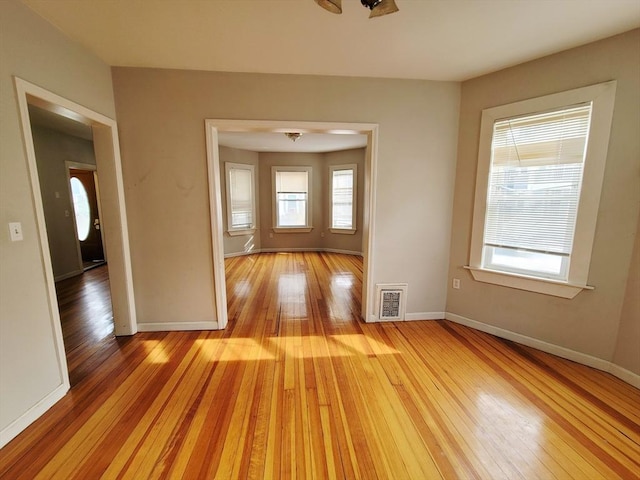 hall with light wood-type flooring