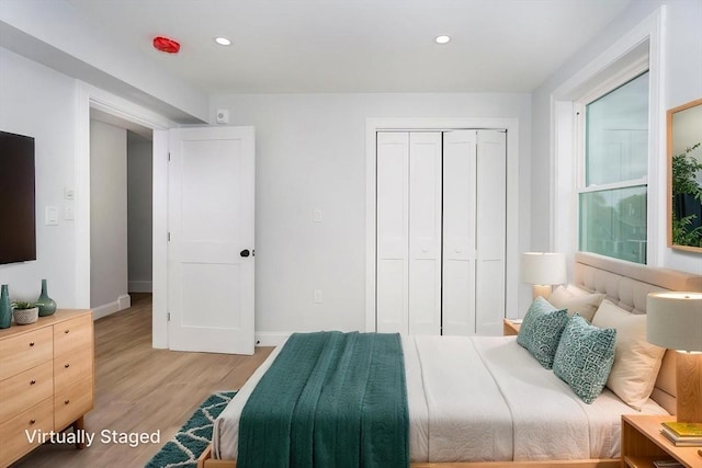 161 Sumner St Unit 1, Quincy, MA 02169 - bedroom with a closet, light wood finished floors, recessed lighting, and baseboards