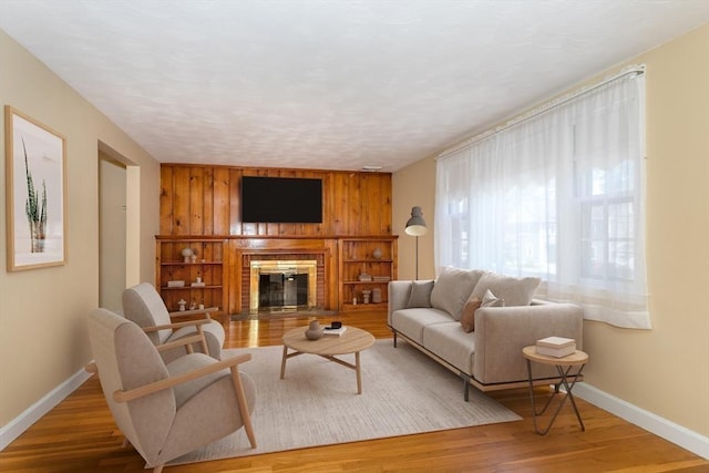69 Gerald Rd, Milton, MA 02186 - living room with a fireplace and wood finished floors