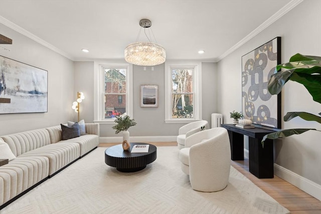 living room with crown molding, radiator heating unit, and light wood-type flooring