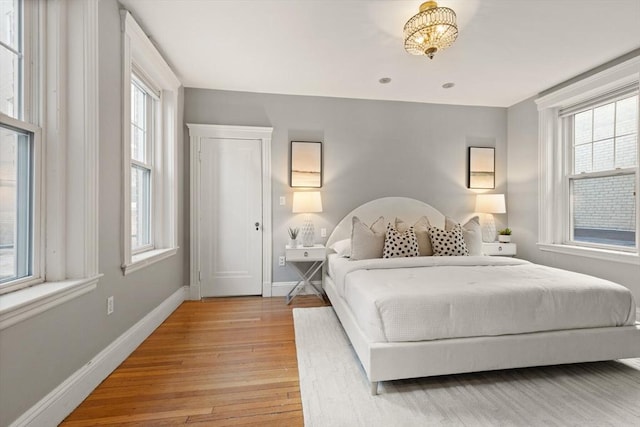 bedroom featuring light wood-type flooring