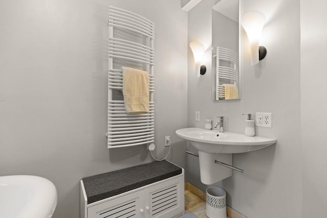 bathroom with radiator heating unit