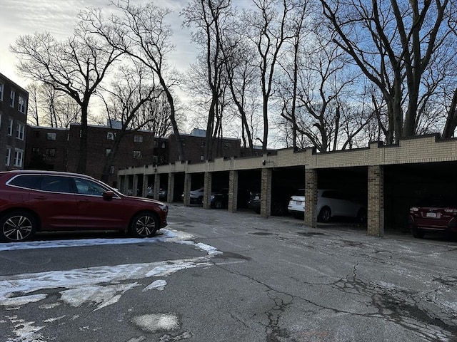 view of parking featuring a carport