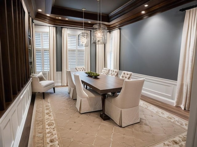 dining area featuring crown molding