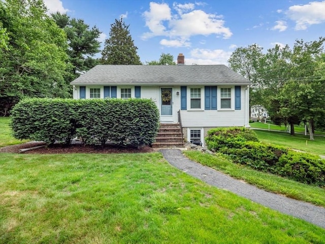 12 Allen St, Pembroke, MA 02359 - view of front facade featuring a chimney, a front yard, and entry steps