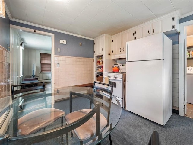 12 Allen St, Pembroke, MA 02359 - kitchen featuring white appliances, ornamental molding, white cabinetry, washer / clothes dryer, and carpet floors