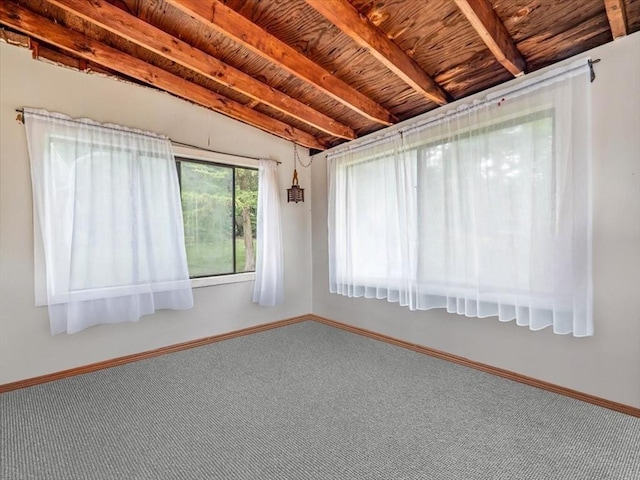 12 Allen St, Pembroke, MA 02359 - carpeted empty room with beam ceiling and baseboards