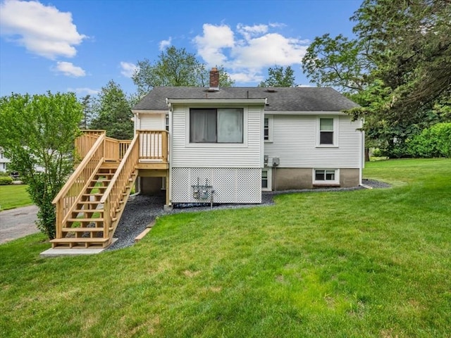 12 Allen St, Pembroke, MA 02359 - rear view of house with a chimney, stairs, a yard, and a deck