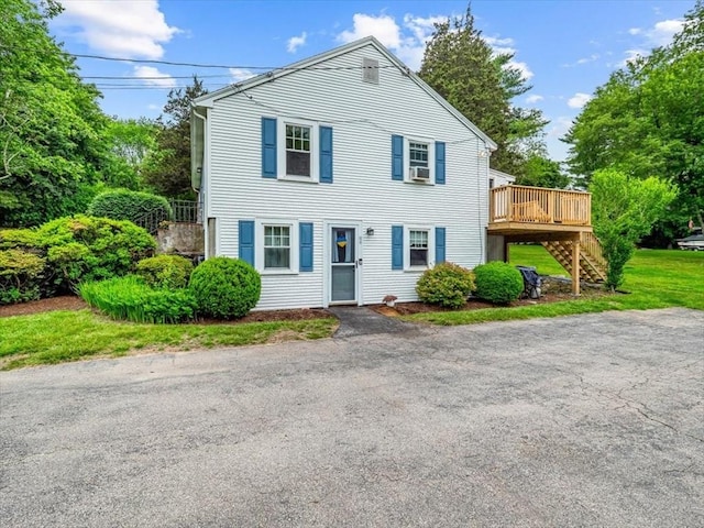12 Allen St, Pembroke, MA 02359 - view of front of home featuring stairway, a wooden deck, and cooling unit