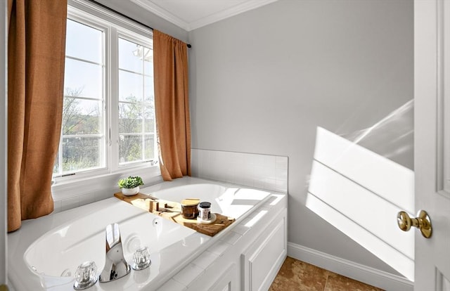 full bath featuring crown molding, baseboards, and a garden tub