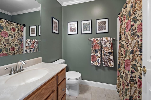 bathroom with crown molding, tile patterned floors, baseboards, vanity, and toilet