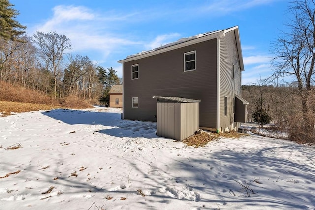 view of snow covered house