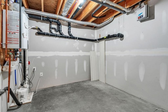 unfinished below grade area featuring water heater