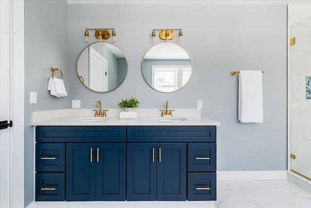 bathroom with a shower with door and vanity