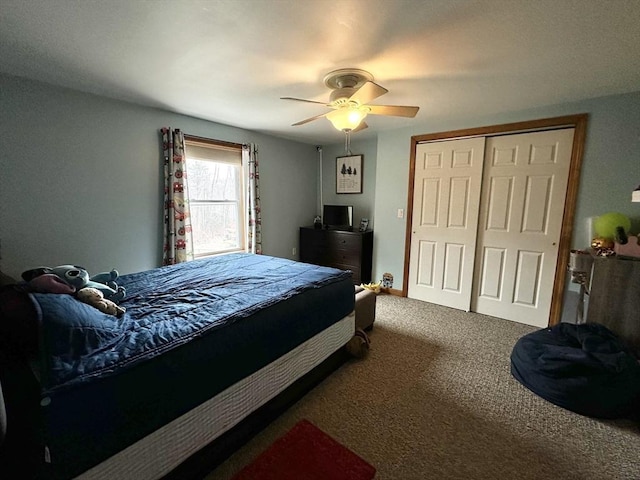 bedroom featuring a closet, a ceiling fan, and carpet