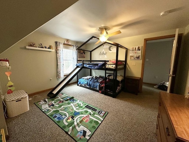 carpeted bedroom with baseboards and a ceiling fan