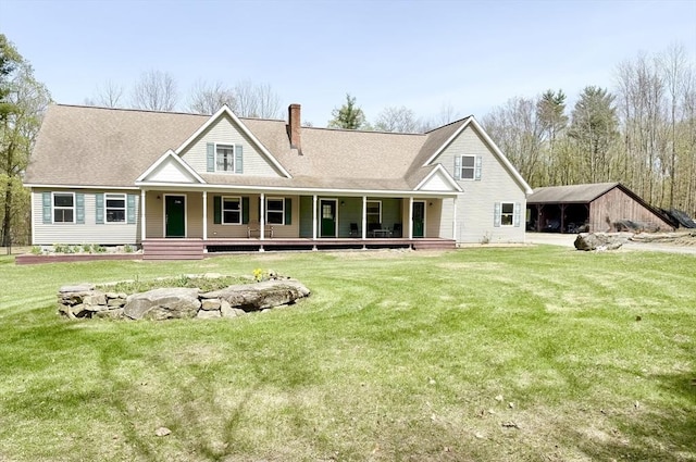 279 Goss Hl, Chester, MA 01050 - rear view of house featuring a porch, a chimney, and a lawn