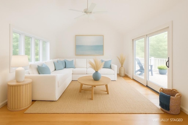9 Dacey Dr, Barnstable, MA 02632 - living area with wood finished floors, vaulted ceiling, and ceiling fan