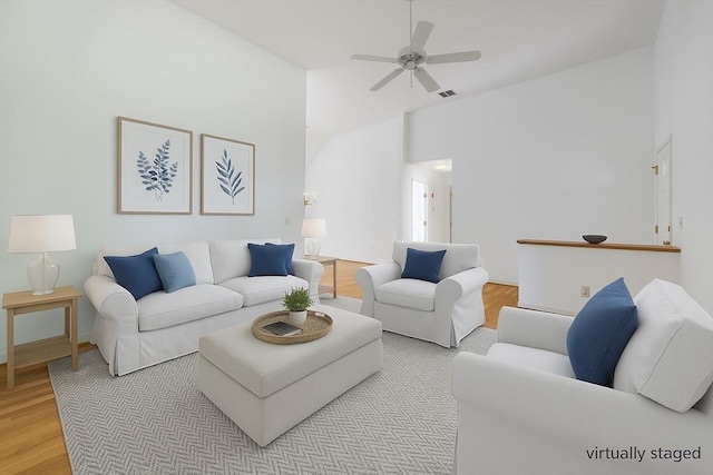 9 Dacey Dr, Barnstable, MA 02632 - living room featuring a ceiling fan, wood finished floors, and lofted ceiling