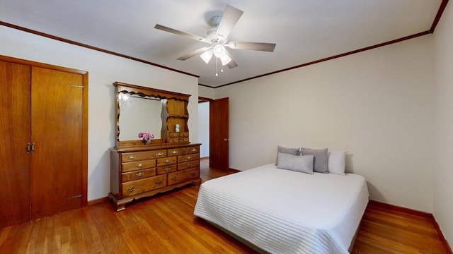 40 Revere St, Gloucester, MA 01930 - bedroom featuring wood finished floors, ceiling fan, and ornamental molding