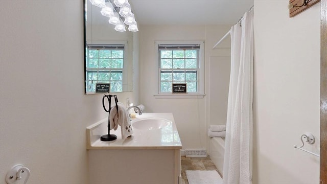 40 Revere St, Gloucester, MA 01930 - bathroom with vanity and shower / bath combo with shower curtain