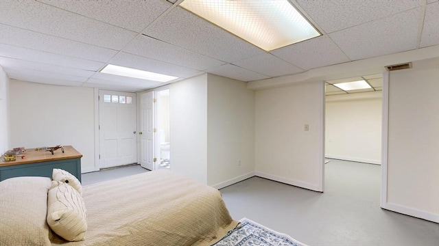 40 Revere St, Gloucester, MA 01930 - bedroom featuring finished concrete flooring, a paneled ceiling, a spacious closet, and a closet