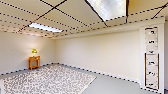40 Revere St, Gloucester, MA 01930 - empty room with finished concrete floors and a paneled ceiling
