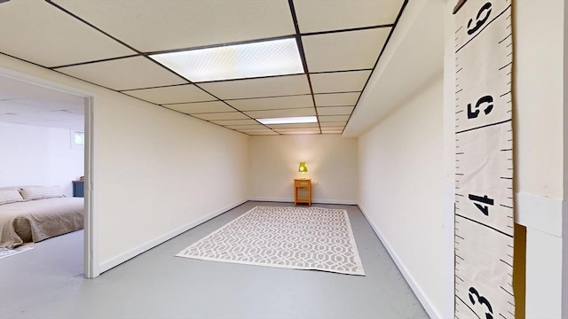 40 Revere St, Gloucester, MA 01930 - unfurnished room with concrete floors and a paneled ceiling