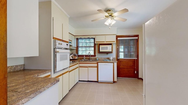 40 Revere St, Gloucester, MA 01930 - kitchen featuring white appliances, ceiling fan, ornamental molding, and white cabinets