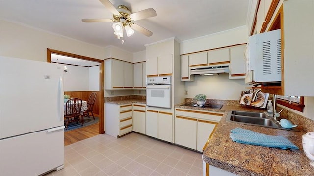 40 Revere St, Gloucester, MA 01930 - kitchen with white appliances, under cabinet range hood, ornamental molding, and a ceiling fan