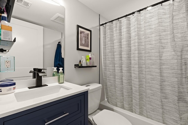 full bathroom featuring vanity, toilet, and shower / bath combo