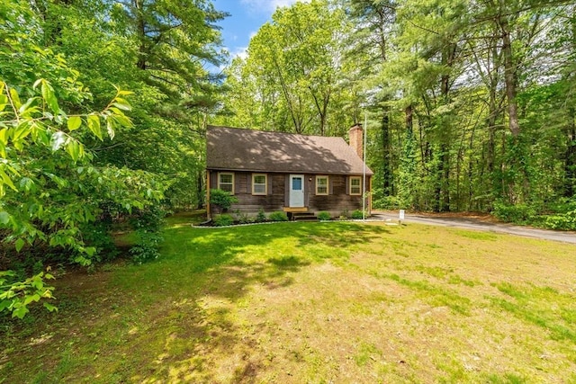 53 Greenleaf Dr, Hampden, MA 01036 - view of front of property with a chimney and a front lawn