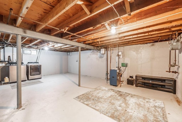 53 Greenleaf Dr, Hampden, MA 01036 - unfinished basement featuring washing machine and dryer and a heating unit