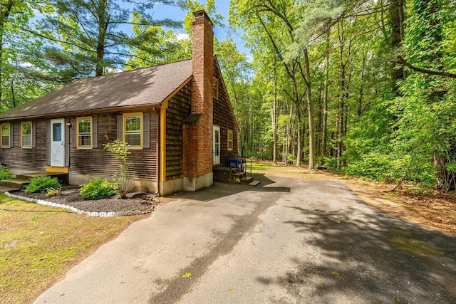 53 Greenleaf Dr, Hampden, MA 01036 - view of front of home with asphalt driveway and a chimney