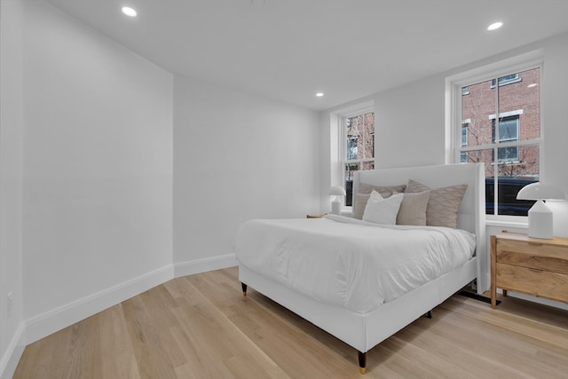 bedroom featuring light hardwood / wood-style floors